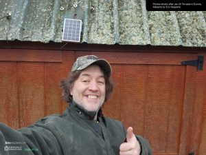 Eric Hepperle gives the thumbs up on that the mini solar panel on the Hepperle Homestead tool shed was undamaged